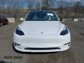 2024 Tesla Model Y with VIN 7SAYGDED2RF089010, listed as a IAAI auction lot 41630222 with 18,366 mi miles and . Bid and sale history available at carsss.com. Image 12.