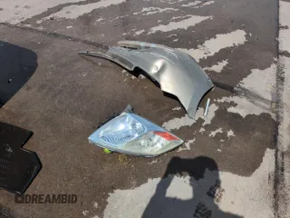 2005 Toyota Prius z VIN JTDKB20U453074321, wystawiony jako Copart lot #58217285 z przebiegiem 299 999 mil mil oraz Szkoda całkowita • Salvage title. Historia ofert i sprzedaży dostępna na DreamBid. Obrazek 12.
