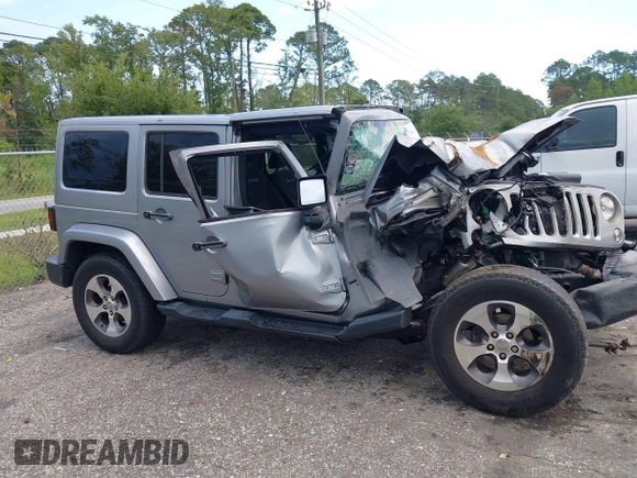 2016 Jeep Wrangler Unlimited Sahara with VIN 1C4BJWEG3GL240859, listed as a IAAI auction lot 42628937 with 103,378 mi miles and . Bid and sale history available at DreamBid. Image 13.