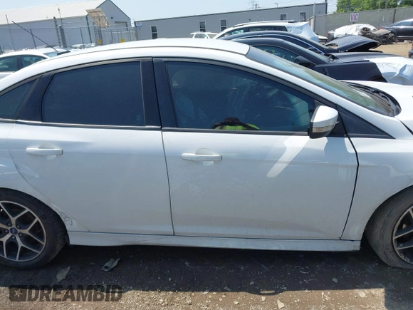 2016 Ford Focus SE with VIN 1FADP3F27GL385739, listed as a IAAI auction lot 42400329 with 114,331 mi miles and . Bid and sale history available at DreamBid. Image 14.