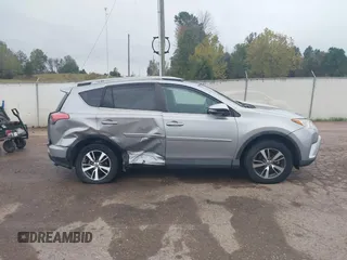 2018 Toyota RAV4 XLE with VIN 2T3WFREV3JW445654, listed as a IAAI auction lot 40849666 with 69,365 mi miles and . Bid and sale history available at DreamBid. Image 13.