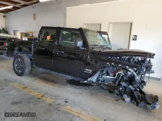 2023 Jeep Gladiator Overland with VIN 1C6HJTFG3PL514611, listed as a Copart auction lot 39195344 with 0 mi miles and Salvage Title. Bid and sale history available at carsss.com. Image 4.