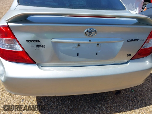 2003 Toyota Camry LE z VIN 4T1BF32K03U561492, wystawiony jako IAAI lot #41607321 z przebiegiem 171 920 mil mil oraz . Historia ofert i sprzedaży dostępna na DreamBid. Obrazek 19.