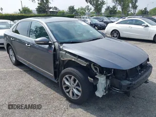 2016 Volkswagen Passat S with VIN 1VWAT7A36GC031403, listed as a IAAI auction lot 42371103 with 86,454 mi miles and . Bid and sale history available at DreamBid. Image 1.