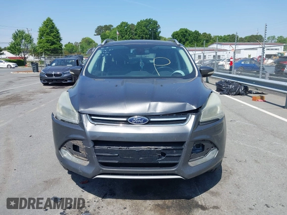 2015 Ford Escape Titanium with VIN 1FMCU0J94FUB24350, listed as a IAAI auction lot 42065641 with 168,215 mi miles. Bid and sale history available at carsss.com. Image 12.