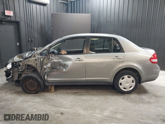 2009 Nissan Versa 1.8 S with VIN 3N1BC11EX9L396439, listed as a IAAI auction lot 42049665 with 49,617 mi miles. Bid and sale history available at carsss.com. Image 14.