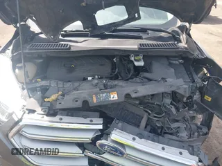 2017 Ford Escape SE z VIN 1FMCU0GD0HUE06774, wystawiony jako IAAI lot #42135955 z przebiegiem 141 807 mil mil oraz . Historia ofert i sprzedaży dostępna na DreamBid. Obrazek 10.