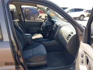 2006 Ford Escape XLS with VIN 1FMYU02Z06KC95676, listed as a IAAI auction lot 42220561 with 169,925 mi miles and . Bid and sale history available at DreamBid. Image 5.