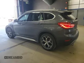 2016 BMW X1 xDrive28i with VIN WBXHT3Z30G4A51936, listed as a Copart auction lot 53752795 with 104,221 mi miles and Salvage Title. Bid and sale history available at carsss.com. Image 2.