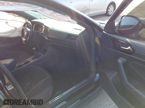 2019 Volkswagen Jetta GLI S z VIN 3VW5T7BU3KM245927, wystawiony jako IAAI lot #41573257 z przebiegiem 57 322 mil mil oraz . Historia ofert i sprzedaży dostępna na DreamBid. Obrazek 5.