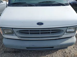2002 Ford Econoline Cargo with VIN 1FTRE14262HB84357, listed as a IAAI auction lot 40880551 with 123,183 mi miles. Bid and sale history available at carsss.com. Image 10.