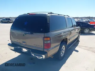 2003 Chevrolet Suburban LT with VIN 1GNEC16Z23J182041, listed as a IAAI auction lot 41731802 with 251,806 mi miles. Bid and sale history available at carsss.com. Image 4.