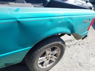 1994 Ford Ranger Splash with VIN 1FTCR10A8RPB83251, listed as a IAAI auction lot 41552632 with 211,719 mi miles. Bid and sale history available at carsss.com. Image 6.