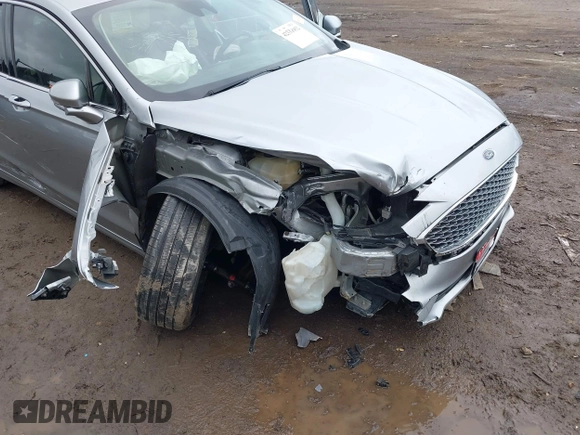 2020 Ford Fusion Titanium with VIN 3FA6P0D98LR115437, listed as a IAAI auction lot 42331052 with 127,346 mi miles and . Bid and sale history available at DreamBid. Image 6.