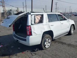 2017 Chevrolet Tahoe LT with VIN 1GNSCBKC4HR182285, listed as a IAAI auction lot 41468693 with 126,860 mi miles. Bid and sale history available at carsss.com. Image 4.