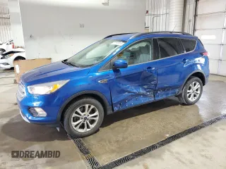 2018 Ford Escape SE z VIN 1FMCU9GD2JUC94263, wystawiony jako Copart lot #57267005 z przebiegiem 73 980 mil mil oraz Szkoda całkowita • Salvage title. Historia ofert i sprzedaży dostępna na DreamBid. Obrazek 1.