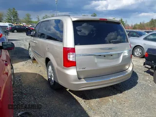 2013 Chrysler Town & Country Touring with VIN 2C4RC1BG8DR559824, listed as a IAAI auction lot 41818237 with 211,248 mi miles. Bid and sale history available at carsss.com. Image 3.