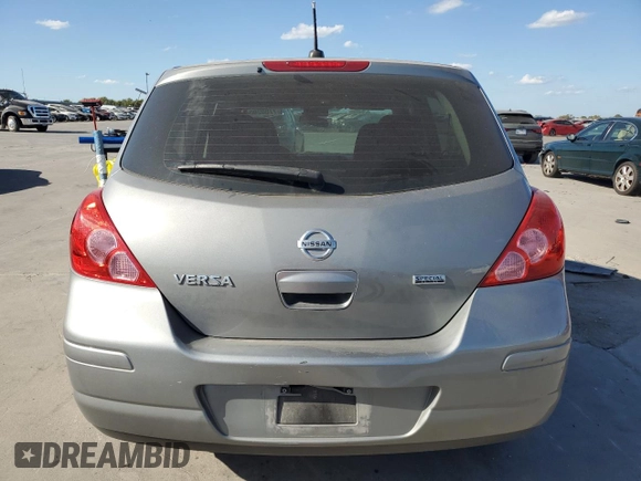 2012 Nissan Versa S with VIN 3N1BC1CP0CK264656, listed as a Copart auction lot 77802904 with 75,115 mi miles and Clean Title. Bid and sale history available at carsss.com. Image 7.