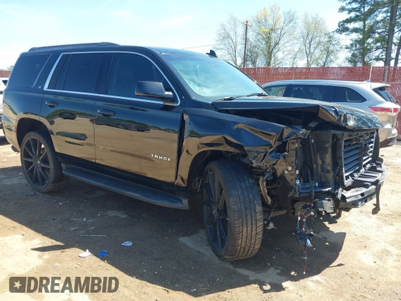 2020 Chevrolet Tahoe LT with VIN 1GNSKBKC7LR159742, listed as a IAAI auction lot 41854694 with 112,087 mi miles and . Bid and sale history available at DreamBid. Image 1.