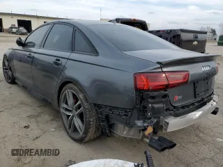 2018 Audi S6 Prestige z VIN WAUHFAFC0JN104241, wystawiony jako Copart lot #70887562 z przebiegiem 89 551 mil mil oraz . Historia ofert i sprzedaży dostępna na DreamBid. Obrazek 2.
