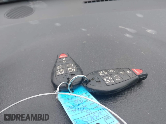 2014 Dodge Grand Caravan SXT with VIN 2C4RDGCG0ER406080, listed as a IAAI auction lot 42023530 with 183,212 mi miles and . Bid and sale history available at DreamBid. Image 11.