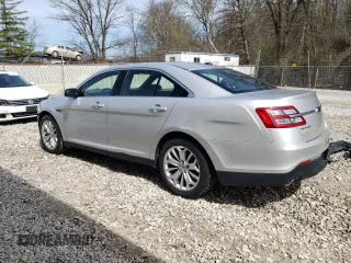 2014 Ford Taurus Limited with VIN 1FAHP2F83EG106227, listed as a Copart auction lot 63055365 with 194,026 mi miles and Salvage title. Bid and sale history available at DreamBid. Image 2.