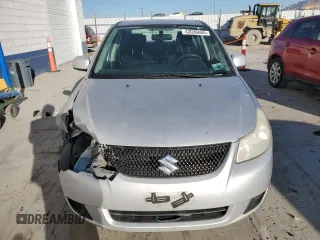2010 Suzuki SX4 LE with VIN JS2YC5A27A6300498, listed as a Copart auction lot 43036655 with 237,647 mi miles and Salvage Title. Bid and sale history available at carsss.com. Image 5.