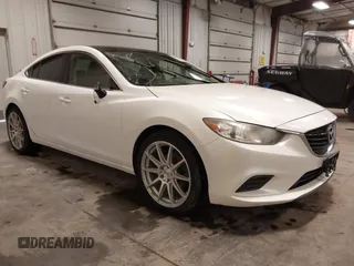 2015 Mazda 6 i Sport with VIN JM1GJ1U51F1207121, listed as a IAAI auction lot 41824727 with 150,618 mi miles and . Bid and sale history available at DreamBid. Image 1.