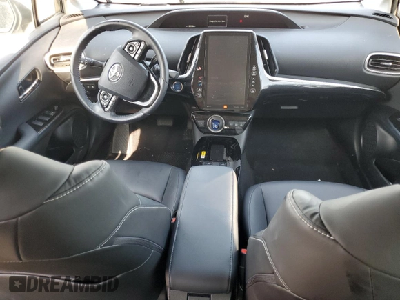 2021 Toyota Prius LE with VIN JTDKAMFP3M3166034, listed as a Copart auction lot 63271275 with 52,536 mi miles and Salvage title. Bid and sale history available at DreamBid. Image 8.