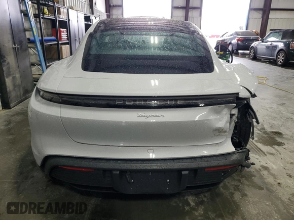 2025 Porsche Taycan with VIN WP0AA2Y12SSA08315, listed as a Copart auction lot 56624715 with 6,910 mi miles and Salvage title. Bid and sale history available at DreamBid. Image 6.