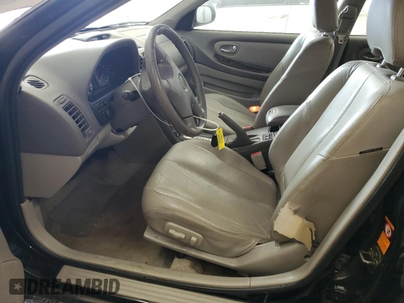 2000 Nissan Maxima GXE z VIN JN1CA31A1YT211725, wystawiony jako Copart lot #47401895 z przebiegiem 122 228 mil mil oraz Szkoda całkowita • Salvage title. Historia ofert i sprzedaży dostępna na DreamBid. Obrazek 7.