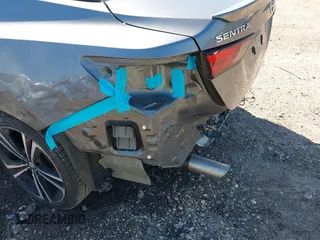 2020 Nissan Sentra SR z VIN 3N1AB8DVXLY262821, wystawiony jako IAAI lot #42085696 z przebiegiem 102 191 mil mil oraz . Historia ofert i sprzedaży dostępna na DreamBid. Obrazek 17.