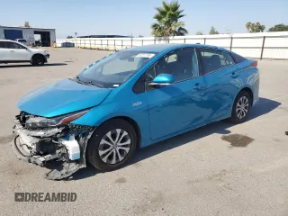 2021 Toyota Prius LE с VIN JTDKAMFP0M3165634, выставлен на аукционе Copart как лот 62217185 с пробегом 63 264 миль миль и Списание • Salvage title. История ставок и продаж доступна на DreamBid. Изображение 1.