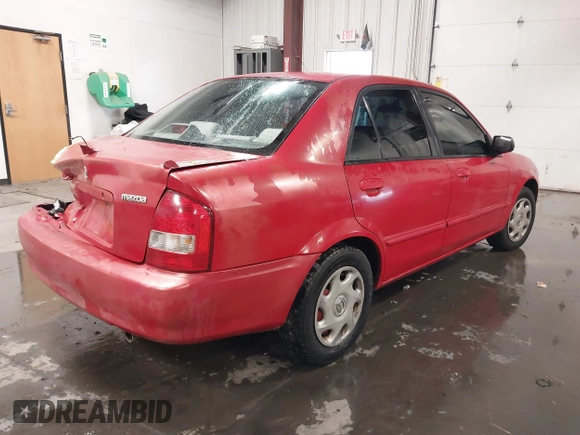 2000 Mazda Protege DX with VIN JM1BJ2220Y0258658, listed as a IAAI auction lot 41622579 with 276,682 mi miles and . Bid and sale history available at DreamBid. Image 4.