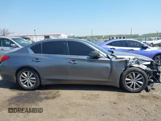 2017 Infiniti Q50 Signature Edition z VIN JN1EV7AR3HM837698, wystawiony jako IAAI lot #42115166 z przebiegiem 95 973 mil mil oraz . Historia ofert i sprzedaży dostępna na DreamBid. Obrazek 13.