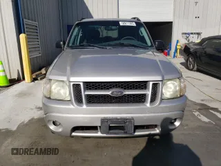 2004 Ford Explorer Sport Trac XLS with VIN 1FMZU67K24UB65144, listed as a Copart auction lot 52611305 with 211,806 mi miles and Salvage title. Bid and sale history available at DreamBid. Image 5.