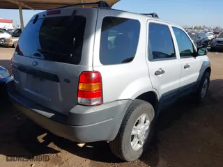 2004 Ford Escape XLT with VIN 1FMYU03114KA43652, listed as a IAAI auction lot 41701166 with 201,035 mi miles. Bid and sale history available at carsss.com. Image 4.