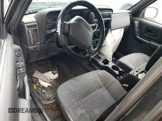 2001 Jeep Cherokee Sport с VIN 1J4FF48S31L615450, выставлен на аукционе Copart как лот 55835585 с пробегом 246 694 миль миль и Списание • Salvage title. История ставок и продаж доступна на DreamBid. Изображение 8.
