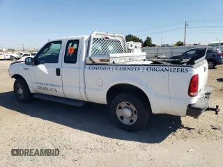 2005 Ford Super Duty F-250 XL with VIN 1FTNX20515EC46784, listed as a Copart auction lot 73200624 with 156,936 mi miles and Salvage Title. Bid and sale history available at carsss.com. Image 2.