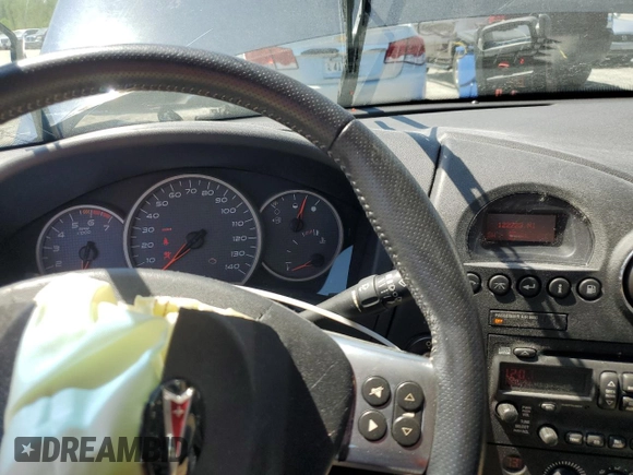 2007 Pontiac Grand Prix with VIN 2G2WP552471223626, listed as a Copart auction lot 52220855 with 122,223 mi miles and Salvage title. Bid and sale history available at DreamBid. Image 9.