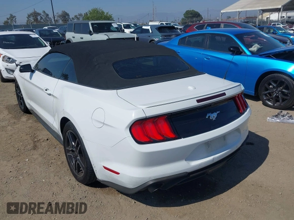 2020 Ford Mustang EcoBoost z VIN 1FATP8UH0L5105965, wystawiony jako IAAI lot #42475841 z przebiegiem 68 999 mil mil oraz . Historia ofert i sprzedaży dostępna na DreamBid. Obrazek 3.