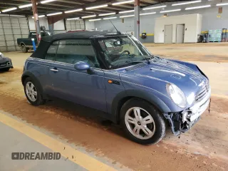 2005 MINI Convertible with VIN WMWRF33485TG10496, listed as a Copart auction lot 58582955 with 107,641 mi miles and Salvage title. Bid and sale history available at DreamBid. Image 4.