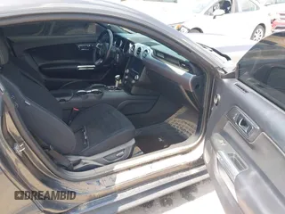 2016 Ford Mustang EcoBoost with VIN 1FA6P8TH1G5215489, listed as a IAAI auction lot 42221155 with 115,615 mi miles and . Bid and sale history available at DreamBid. Image 5.