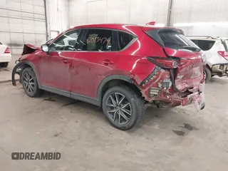 2018 Mazda CX-5 Grand Touring with VIN JM3KFBDM5J0414013, listed as a IAAI auction lot 42013479 with 88,225 mi miles and . Bid and sale history available at DreamBid. Image 3.