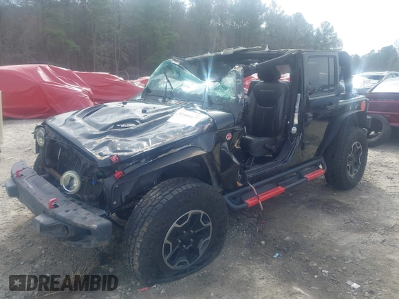 2015 Jeep Wrangler Unlimited Rubicon z VIN 1C4BJWFG7FL711036, wystawiony jako IAAI lot #41604648 z przebiegiem 167 678 mil mil oraz . Historia ofert i sprzedaży dostępna na DreamBid. Obrazek 2.