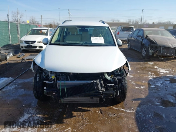 2016 Volkswagen Tiguan SE with VIN WVGBV7AX0GW018760, listed as a IAAI auction lot 41733586 with 60,743 mi miles and . Bid and sale history available at DreamBid. Image 13.
