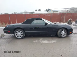 2003 Ford Thunderbird Deluxe with VIN 1FAHP60A53Y102920, listed as a IAAI auction lot 41228106 with 90,854 mi miles. Bid and sale history available at carsss.com. Image 14.