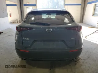 2022 Mazda CX-30 S Carbon Edition с VIN 3MVDMBCL7NM429131, выставлен на аукционе Copart как лот 42421695 с пробегом 21 825 миль миль и Списание • Salvage title. История ставок и продаж доступна на DreamBid. Изображение 6.