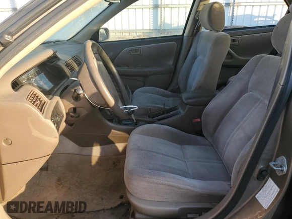 1999 Toyota Camry LE z VIN JT2BF22K0X0167589, wystawiony jako Copart lot #42699015 z przebiegiem 198 634 mil mil oraz Czysty tytuł • Clean title. Historia ofert i sprzedaży dostępna na DreamBid. Obrazek 7.