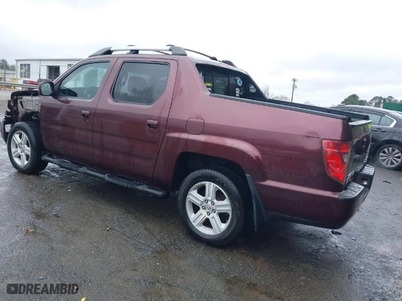 2009 Honda Ridgeline RTL with VIN 5FPYK16559B103698, listed as a IAAI auction lot 41479390 with 144,554 mi miles. Bid and sale history available at carsss.com. Image 3.